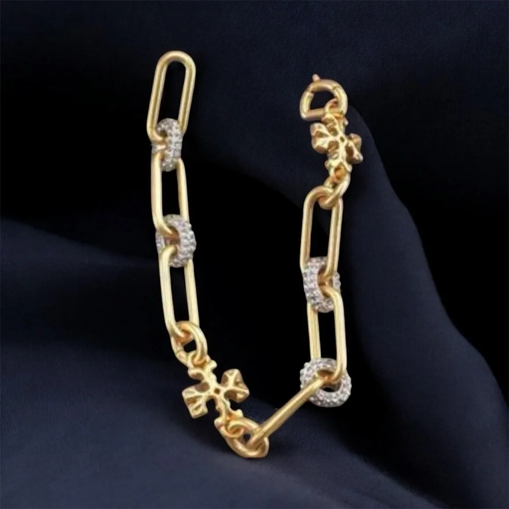 NWOT Auth. Tory Burch Roxanne Pave Bracelet in rolled Tory Antique Gold